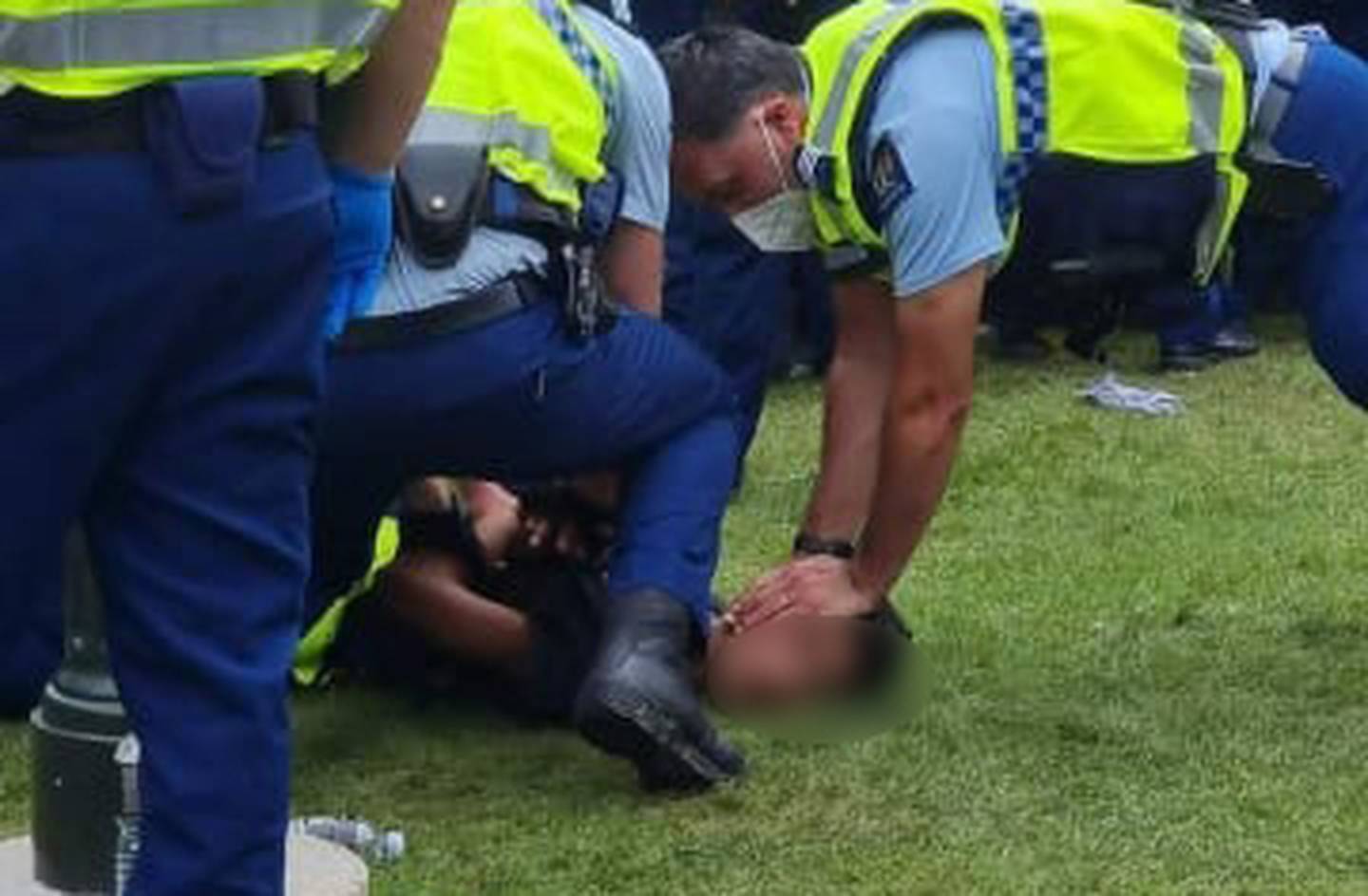 A police officer was filmed holding the boy's head down during arrest. Photo: Supplied