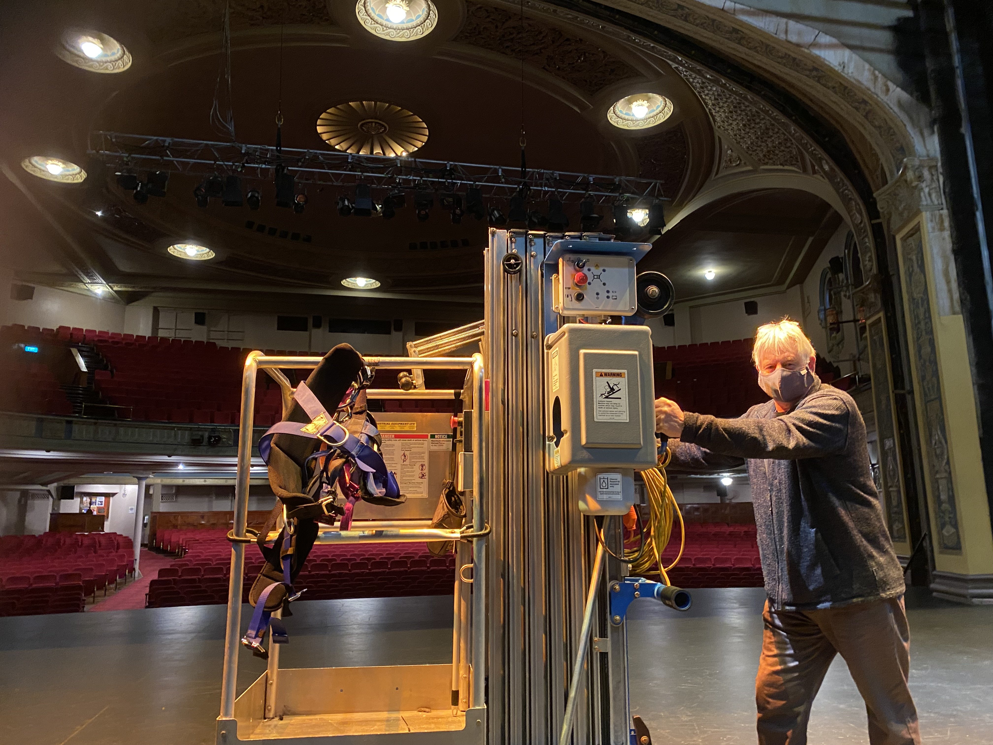 Regent Theatre technical manager Nelson Miles does maintenance in the empty theatre late last...