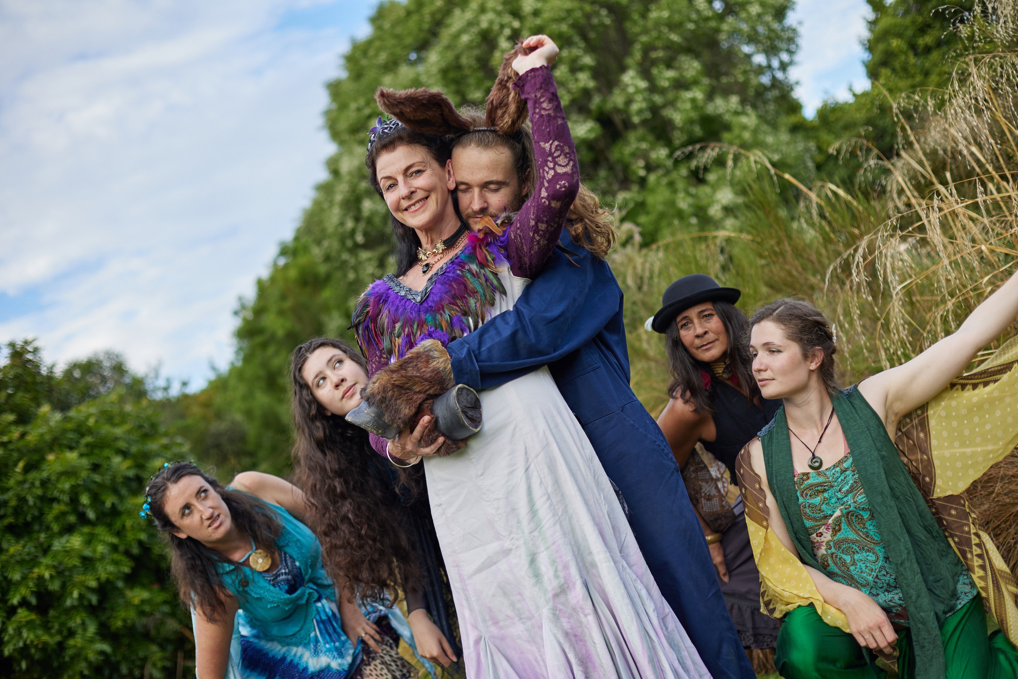 Barbara Power as Titania (centre) and Nick Tipa as Bottom (centre). Fairies  (back, left to right...