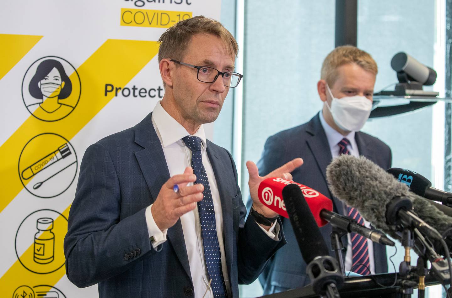 Director-general of health Ashley Bloomfield (front) and Covid-19 Response Minister Chris Hipkins...