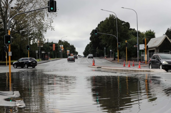 Surface flooding at the intersection of Great North Road and Motions Rd in Grey Lynn, Auckland....