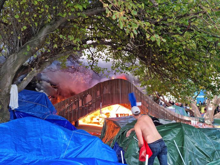 A slide on fire at Parliament's playground. Photo: RNZ