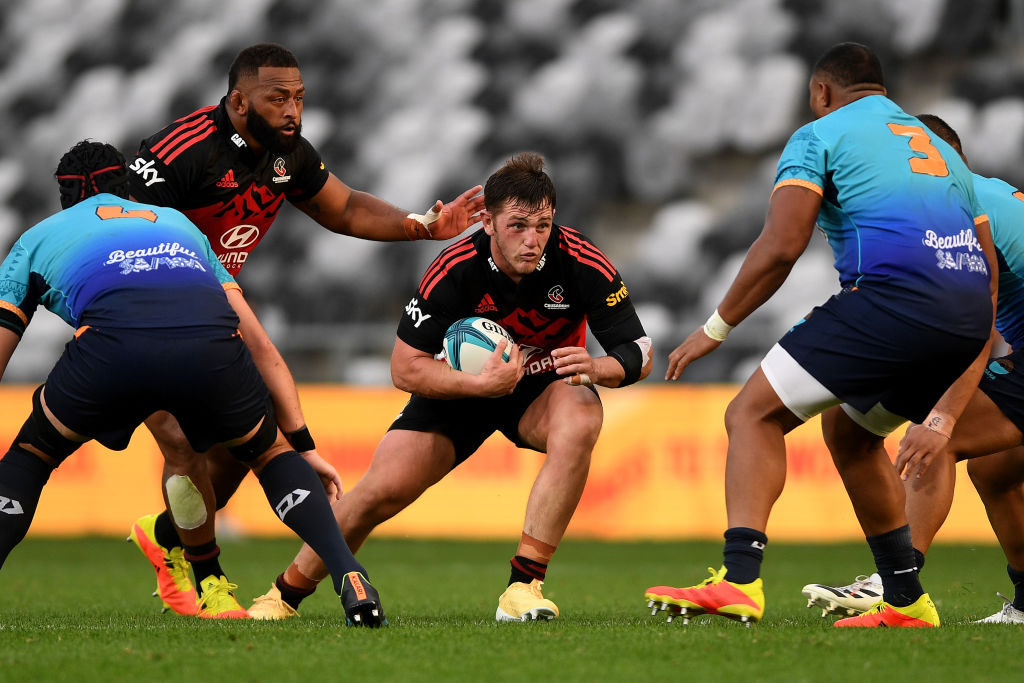 Brodie McAlister runs the ball up for the Crusaders against Moana Pasifika. Photo: Getty