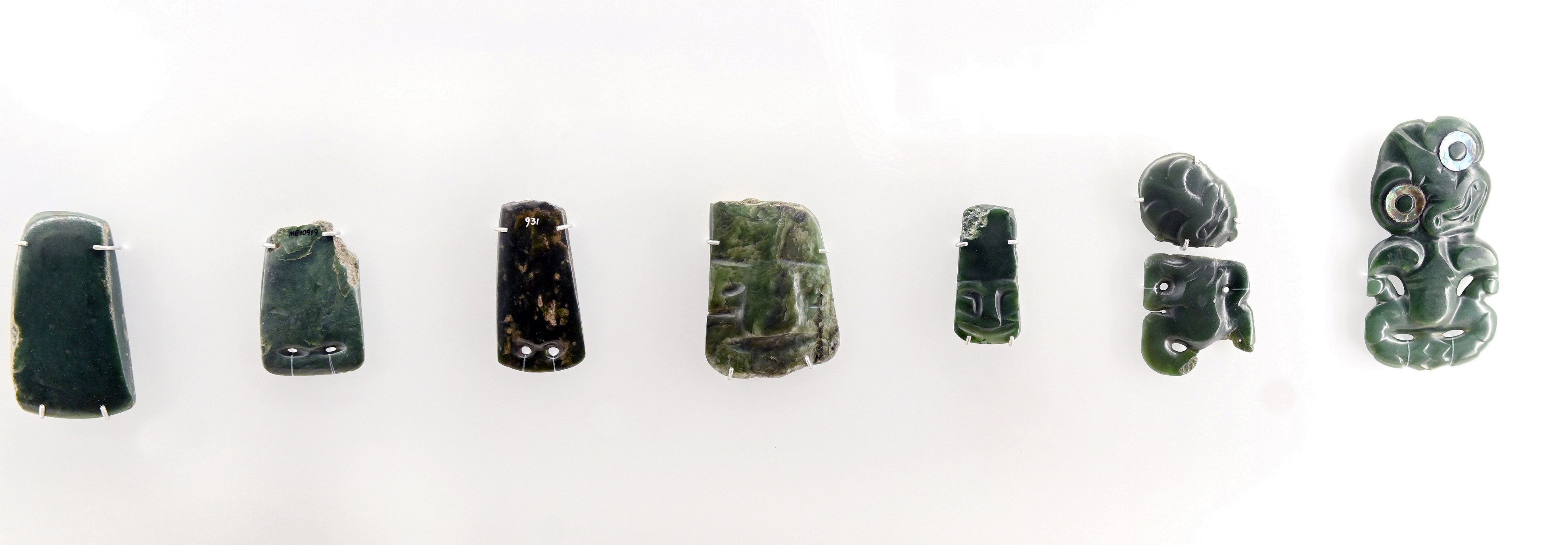 It was not unusual for pounamu tools to be later reshaped as adornments, as shown in this series...