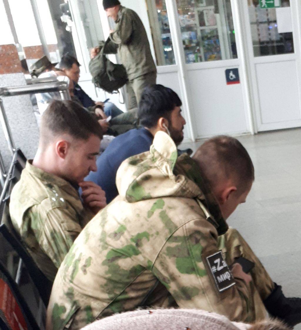 Young Russian conscripts at Belgorod train station near the Ukraine border this week, wearing...
