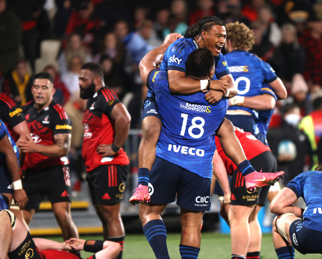 Blues players celebrate their win over the Crusaders. Photo: Getty