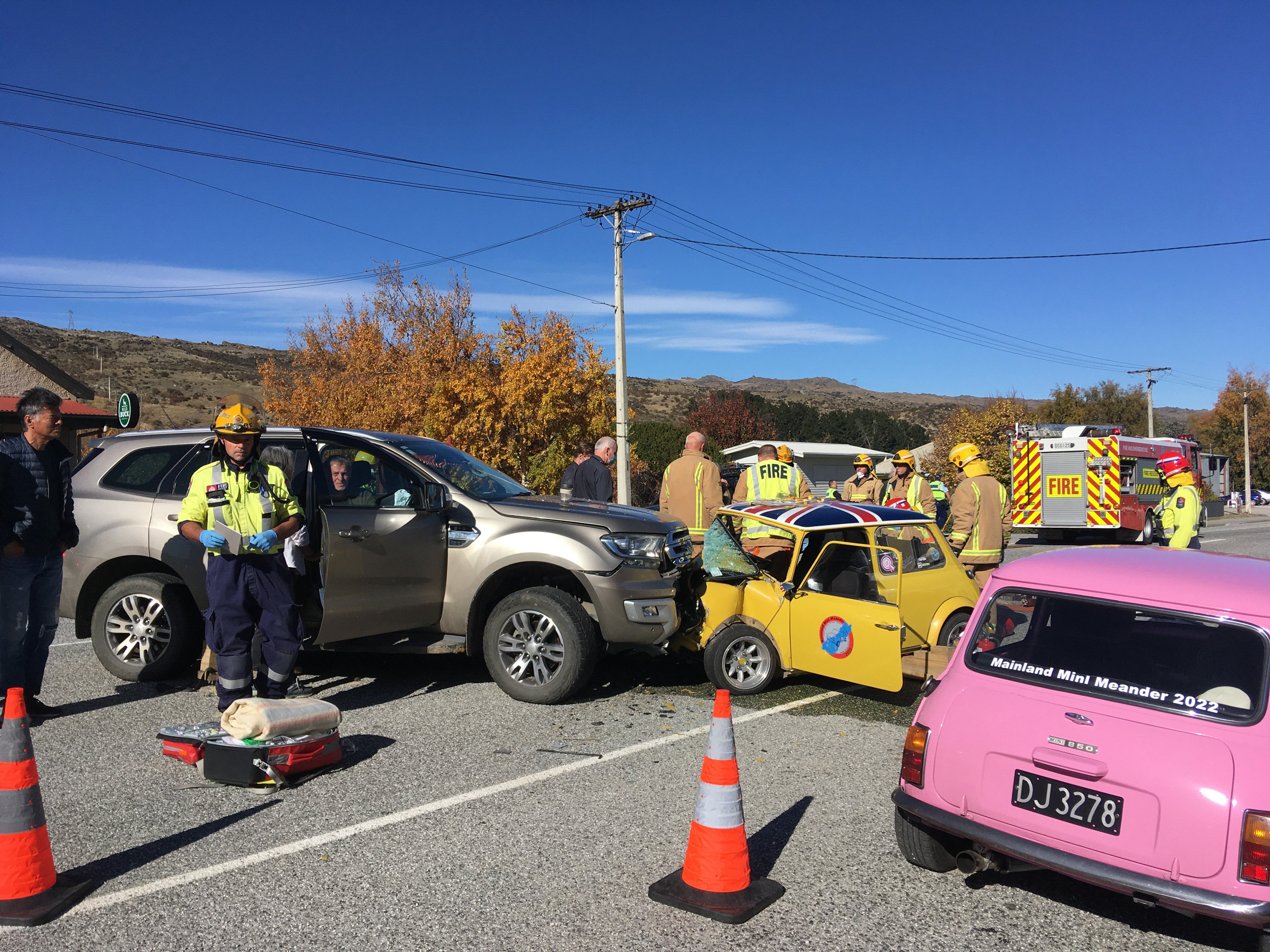 Emergency services attend a serious collision between a Morris Mini and a Ford Everest in the...