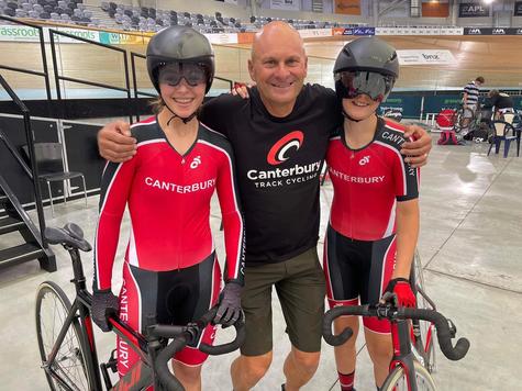 Veteran cycling coach Terry Gyde flanked by Shaylah Sayers (left) and Lizzy Thomson after they...