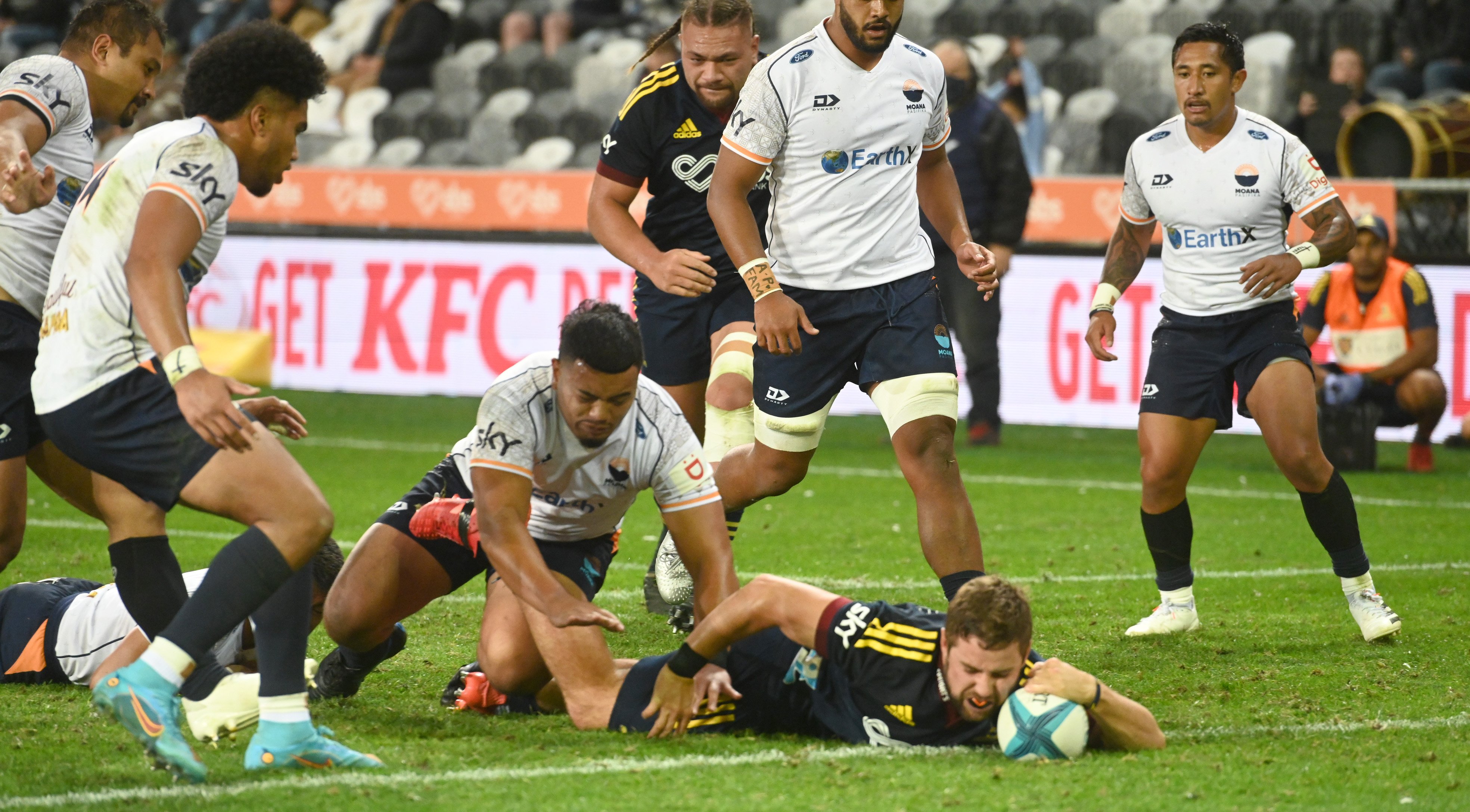 Highlanders reserve hooker Rhys Marshall dives over to score during his team’s Super Rugby...