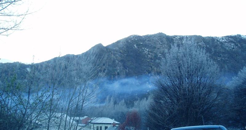 Smoke hangs over Arrowtown in 2009. Photo by ODT.