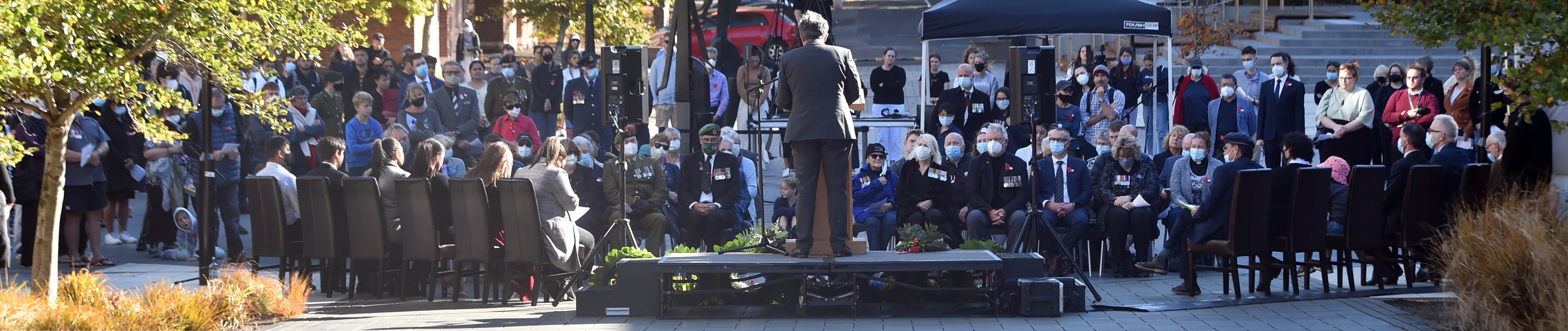 Dunedin Mayor Aaron Hawkins takes the stage at the Otago University Students Association’s Anzac...