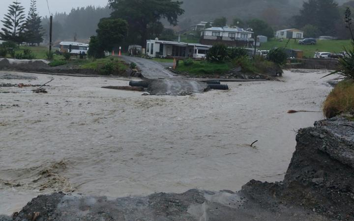 A bridge has washed out in McIlroy Rd in Waipiro. Photo: Facebook / Len Walker