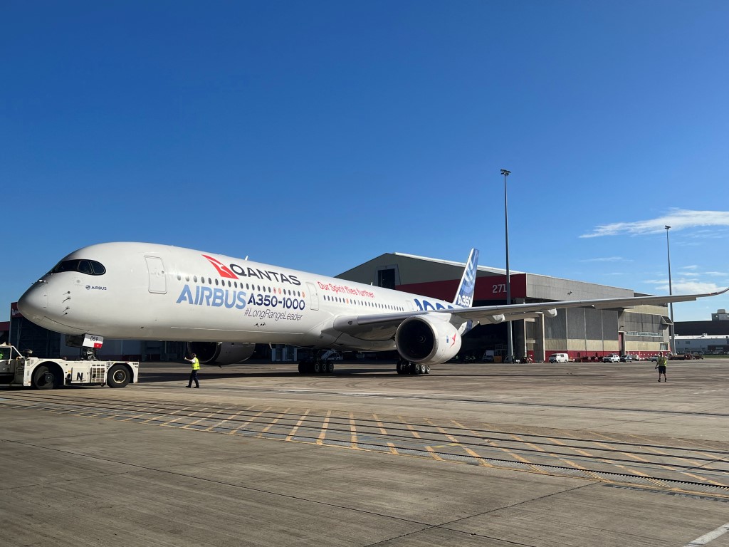 An Airbus A350-1000 test plane arrives at Sydney Airport today. Photo: Reuters