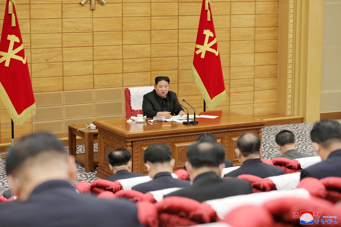 North Korean leader Kim Jong Un speaks at a politburo meeting of the ruling Workers' Party to...