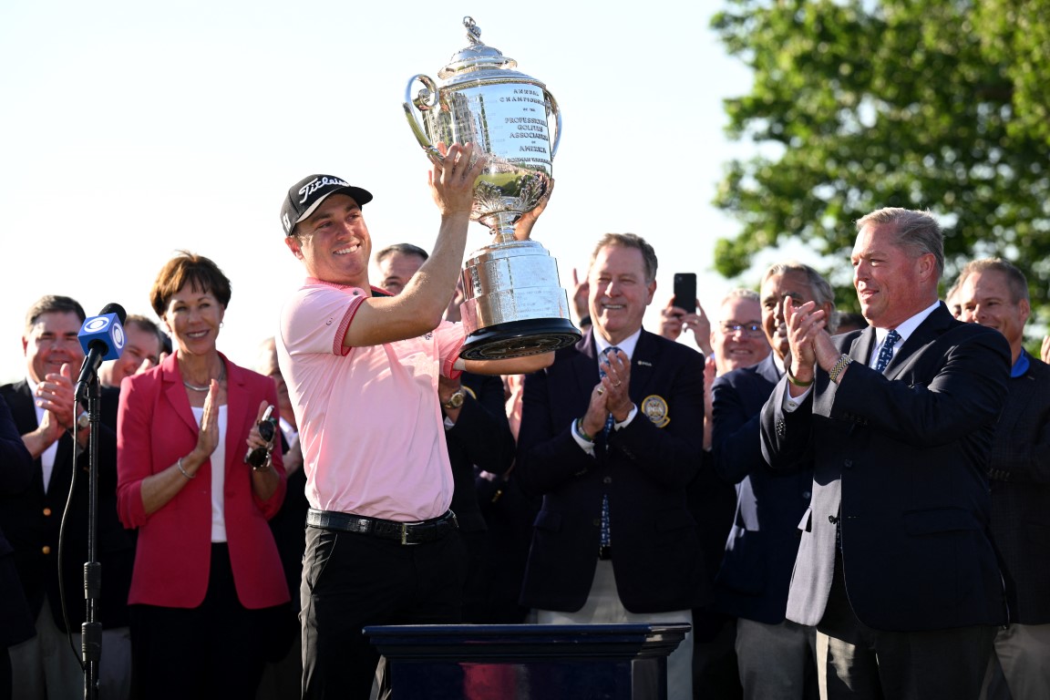 Justin Thomas poses with the trophy after winning the PGA Championship at Southern Hills Country...