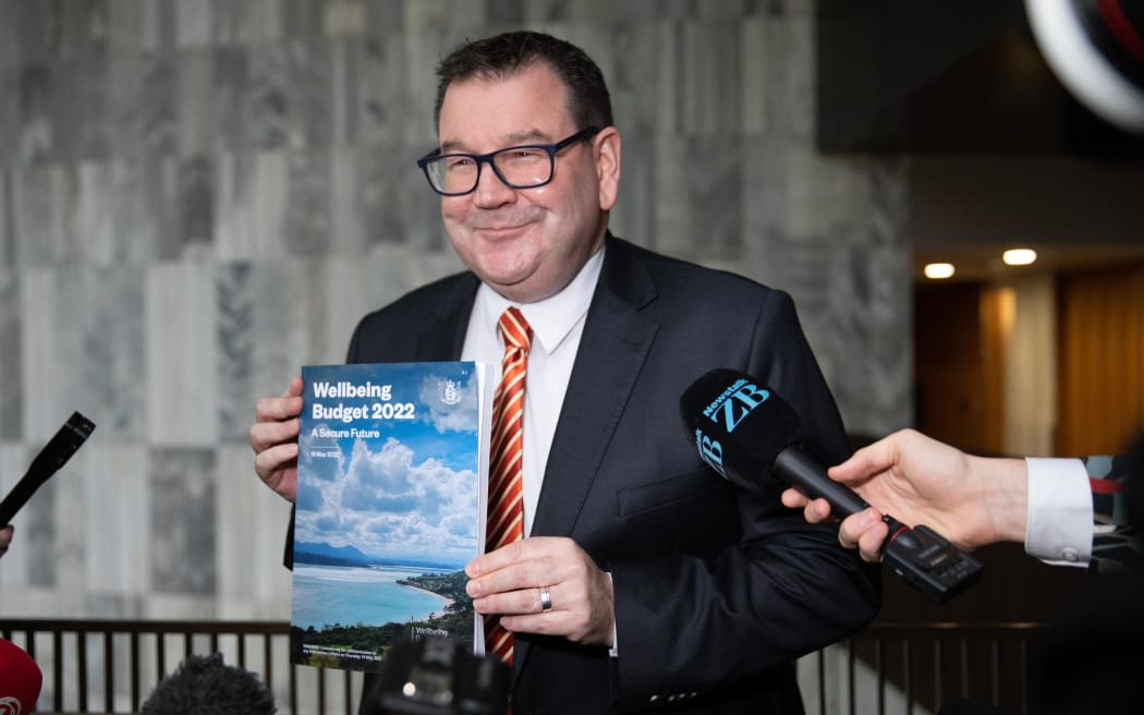 Finance Minister Grant Robertson with the Wellbeing Budget 2022 Photo: RNZ