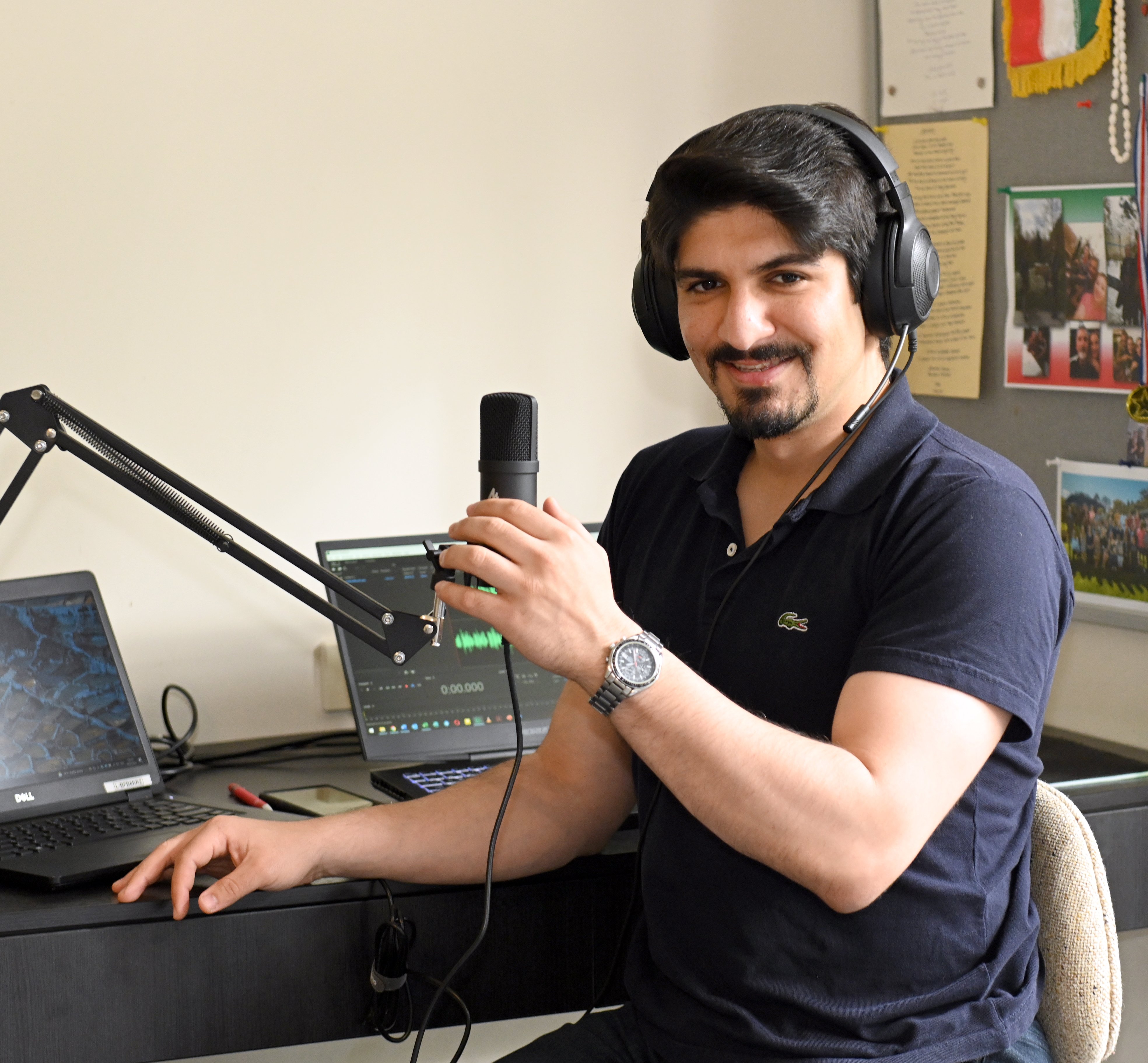 Radio presenter Amir Amini, of Dunedin, prepares another broadcast for Radio Toranj, which has...