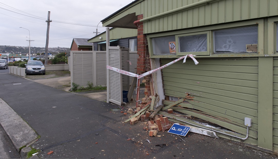 The house was damaged when a car crashed into it on Wednesday night. Photo: Gerard O'Brien