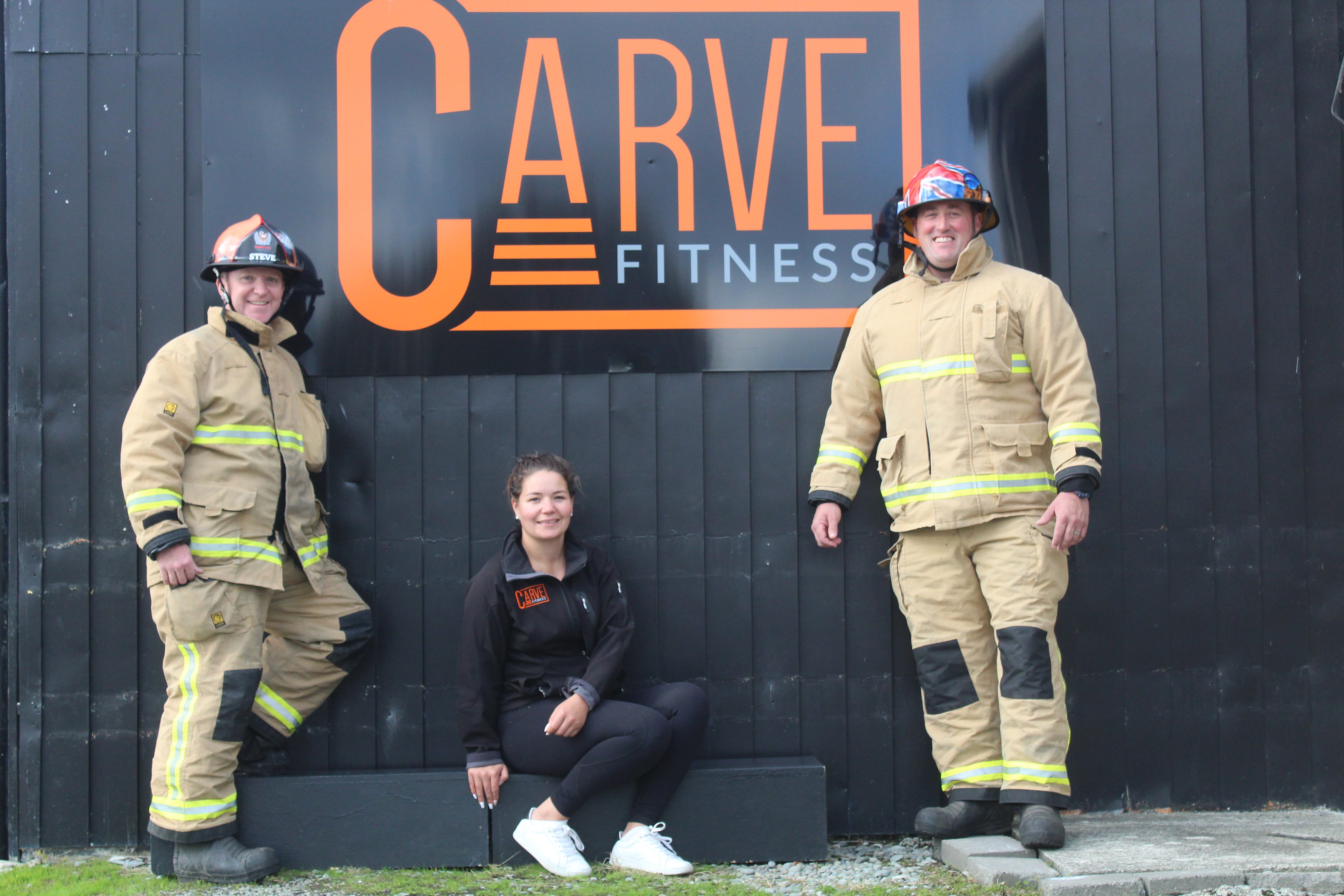 Winton Volunteer Fire Brigade members Steve Turton (left) and Guy Johnstone, along with Carve...