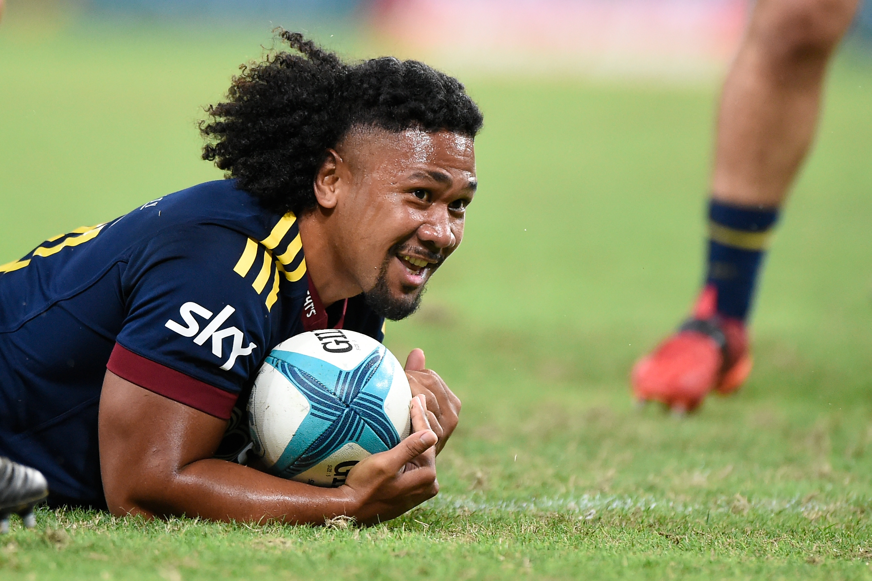 Folau Fakatava scores for the Highlanders against the Reds in Brisbane on Friday night. PHOTO:...