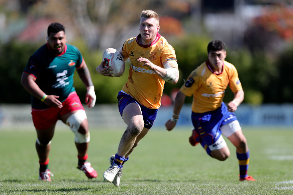 North Otago winger Howard Packman makes a break during the Meads Cup semifinal against Wairarapa...
