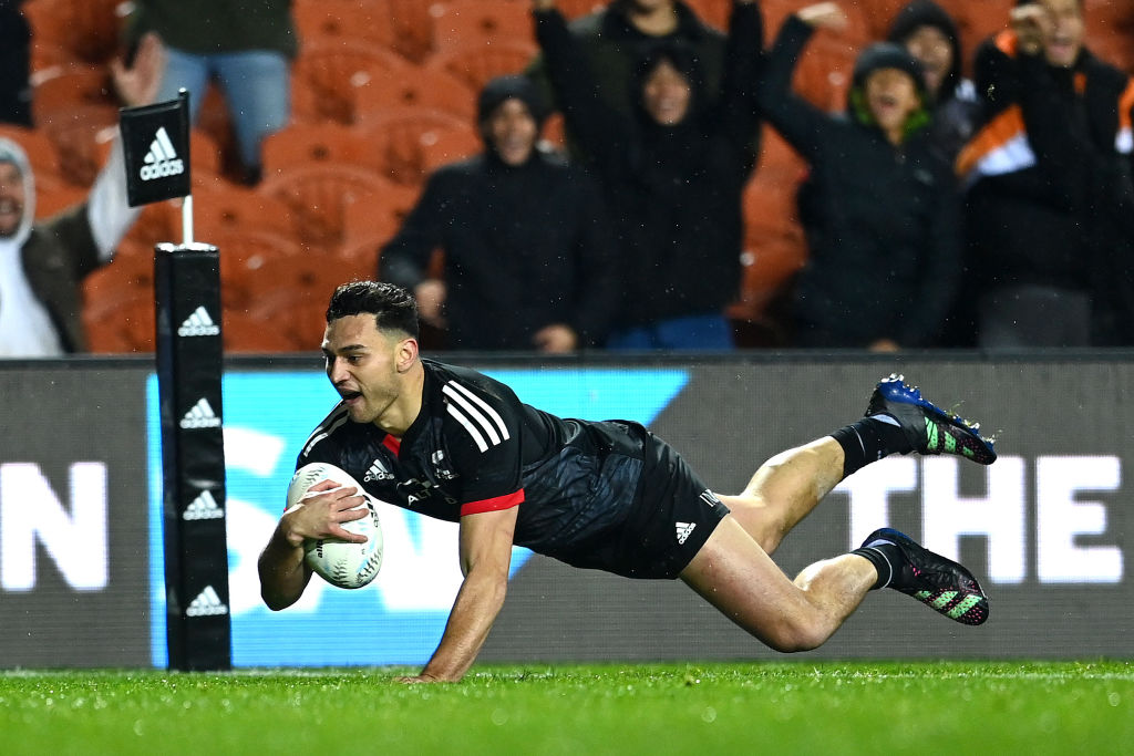 Maori All Blacks wing Shaun Stevenson dives over to score against Ireland in their match in...