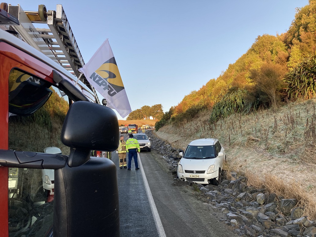 Icy roads around Dunedin made conditions difficult for drivers on Tuesday morning. Photo: Stephen...