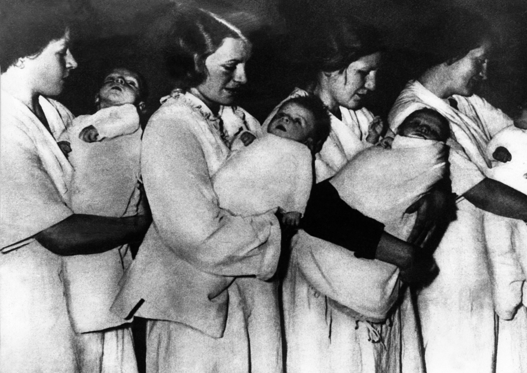 Women carry babies judged to be of ‘Aryan purity’ in a eugenics centre in Nazi Germany. PHOTO:...
