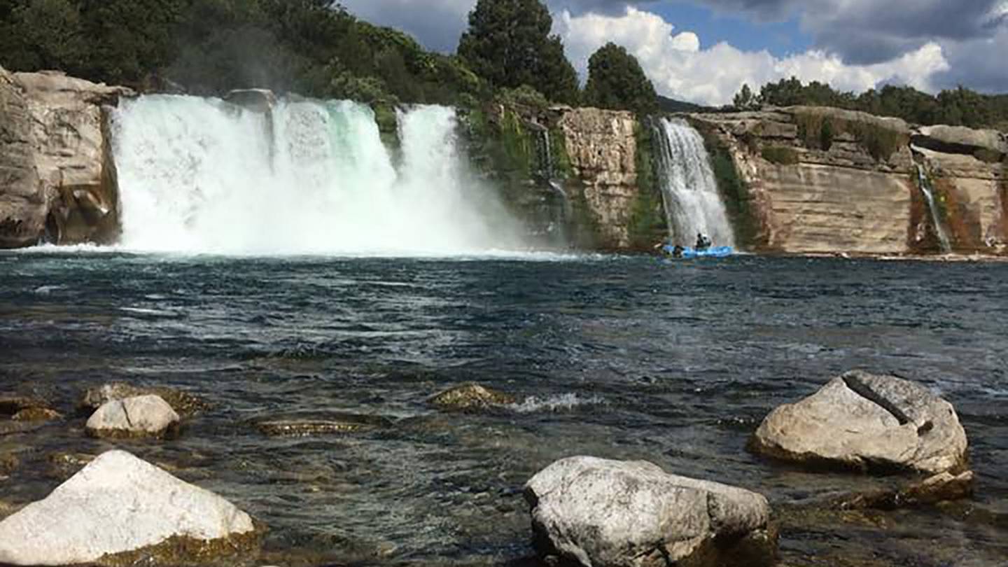 Bad weather has caused police to pause the search for a swimmer missing at Maruia Falls. Photo:...