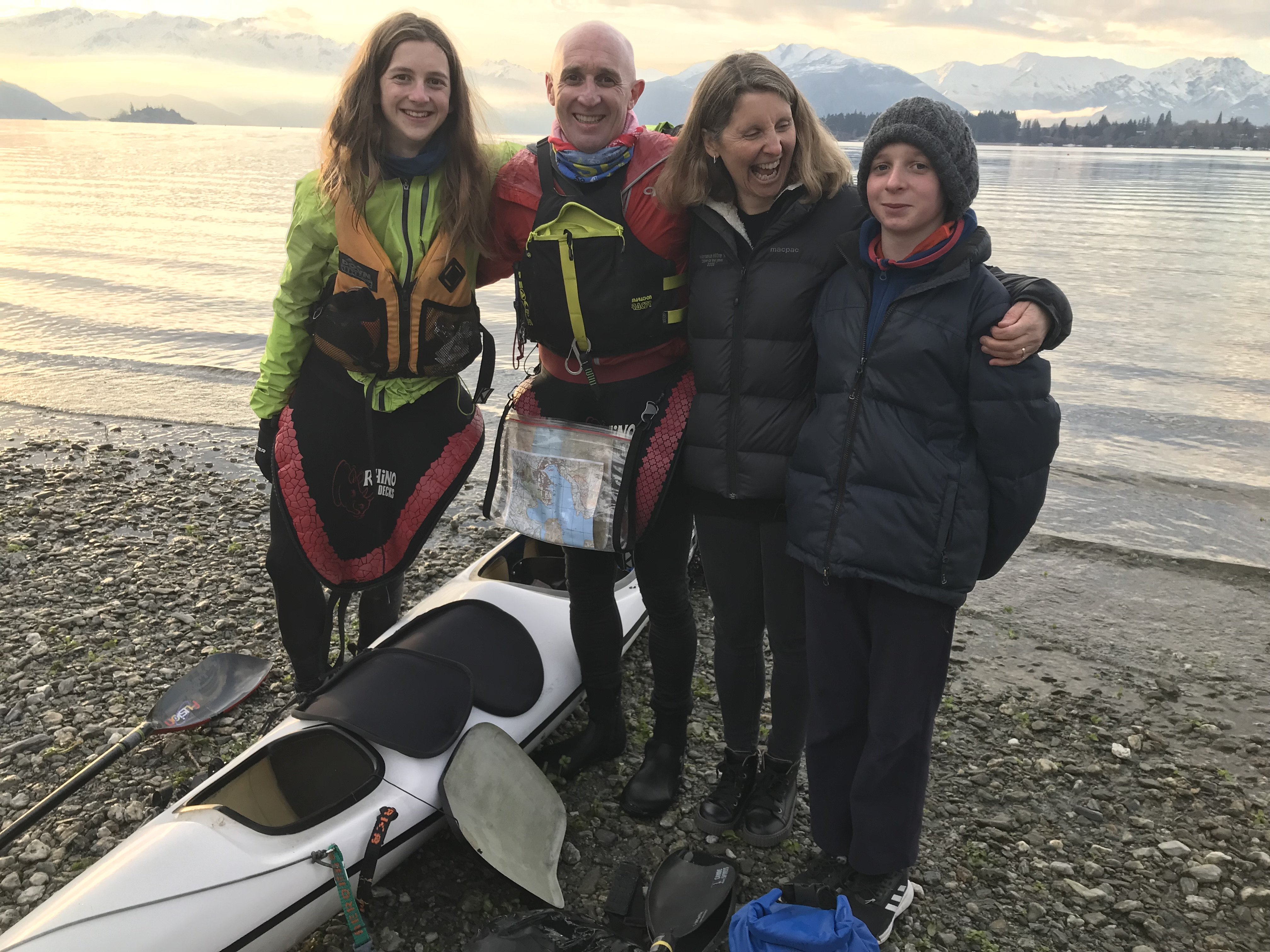 James Watson (15), left, celebrates with his father Mark Watson, his mother Michelle Watson and...