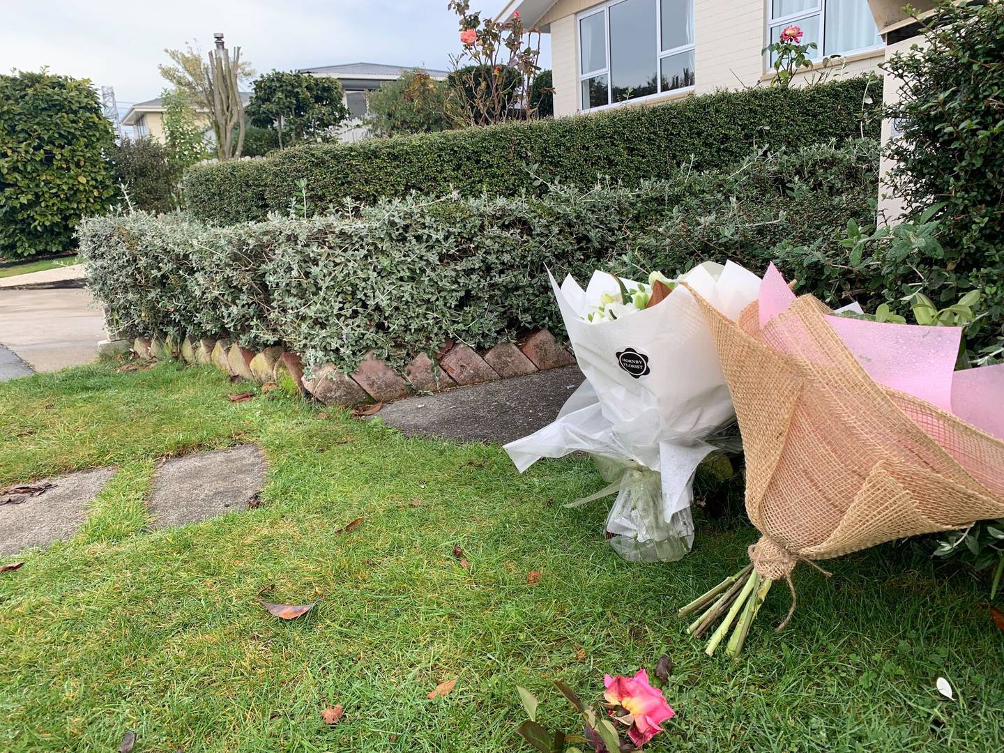 Flowers have been left at the scene. Photo: Kurt Bayer