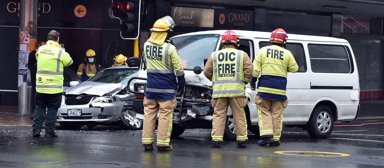 Emergency services at the crash scene this afternoon. PHOTO: PETER MCINTOSH