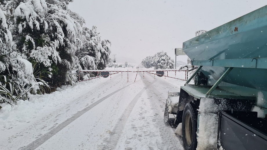 Snow and fallen trees have closed Haast Pass this morning. Photo: NZTA