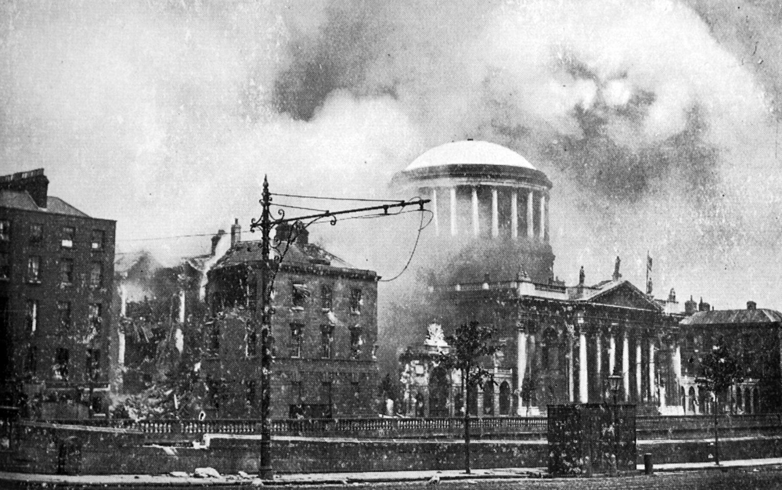 Irish Free State forces capture the Four Courts, Dublin from IRA irregulars: smoke and debris...