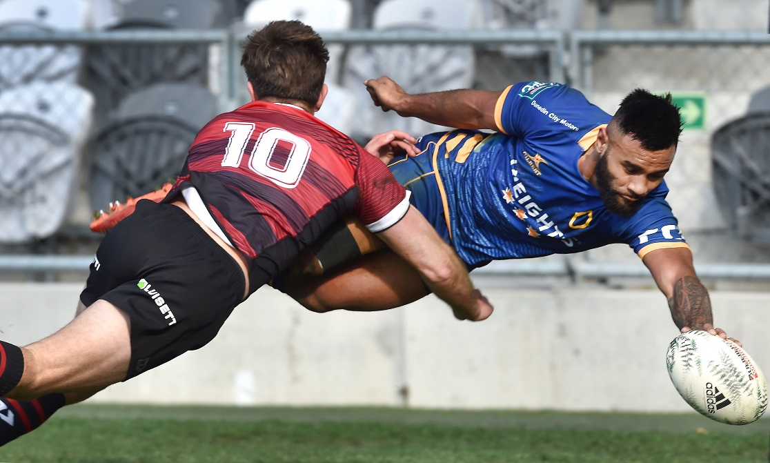 Otago winger Jona Nareki dives for the corner during the preseason game against Canterbury at...