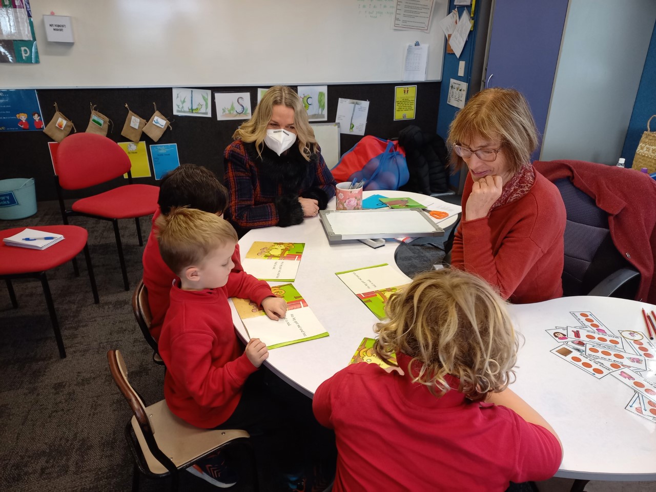 Associate Education Minister Jan Tinetti (top) watches Kaiapoi North School junior team leader...