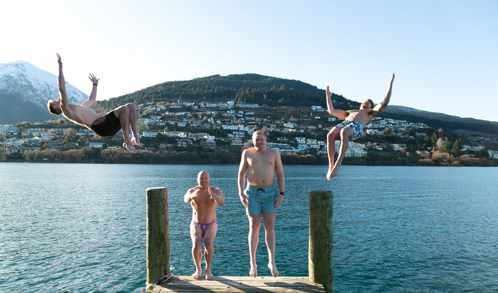 Launching into Lake Wakatipu for the the 226th consecutive day on Sunday are (from left) Paddy...