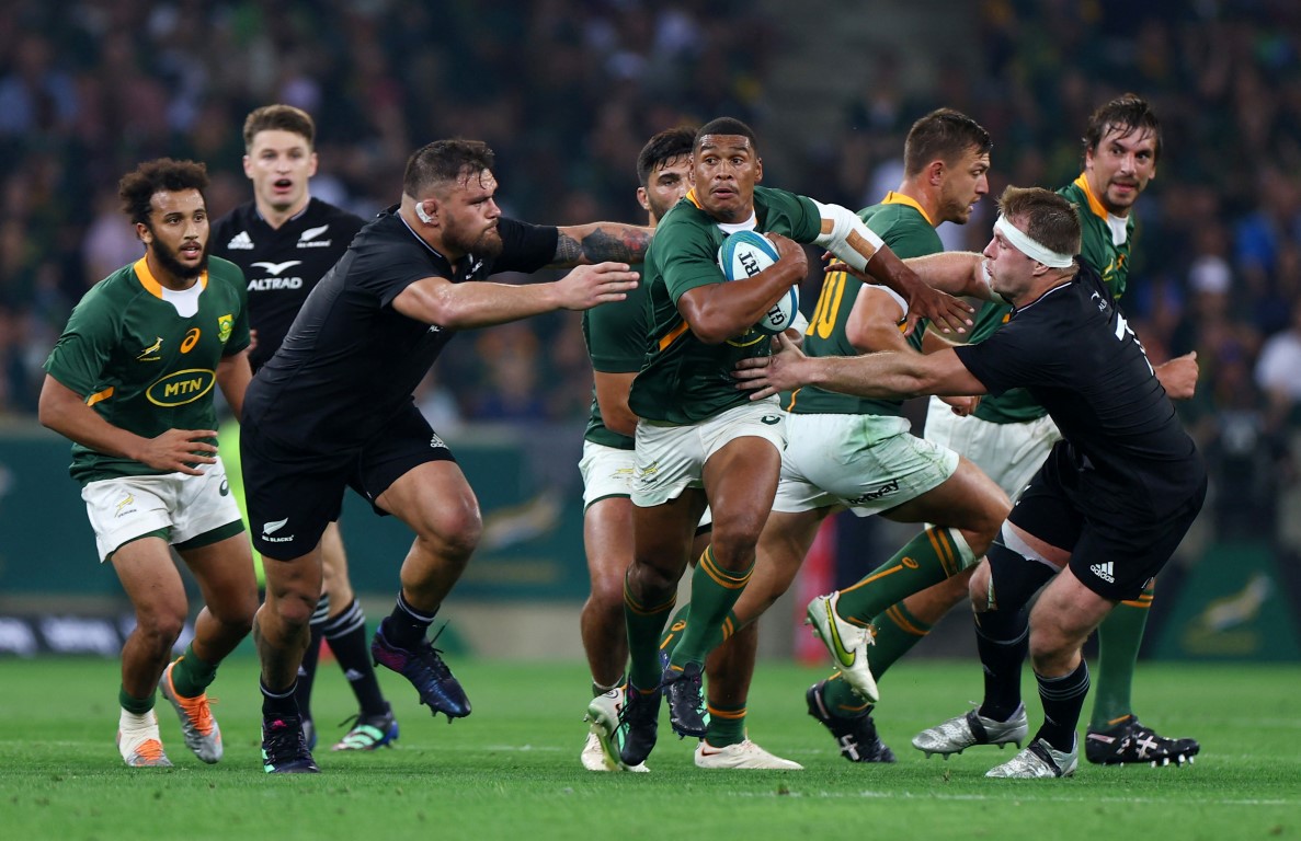 Damian Willemse makes a break for South Africa against New Zealand. Photo: Reuters