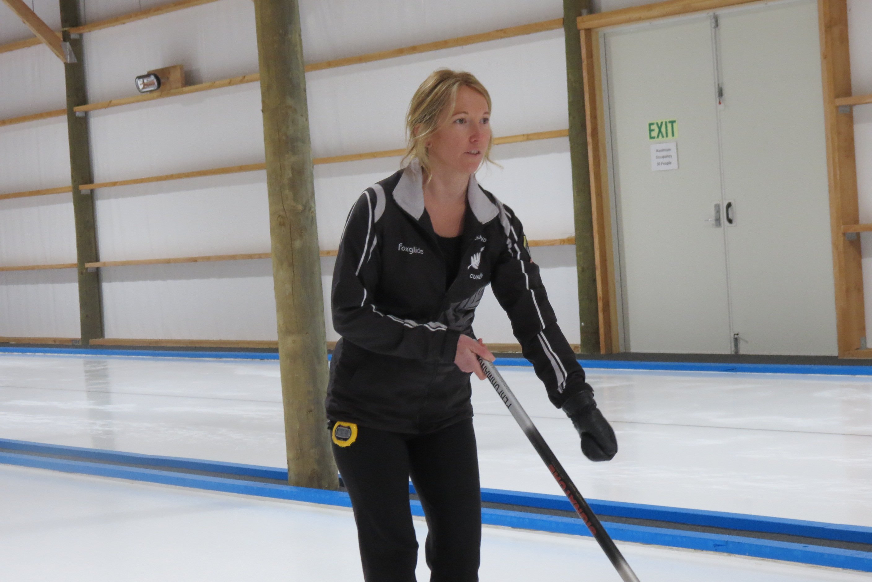 New Zealand representative curler and curling coach Natalie Thurlow instructs newcomers to the...