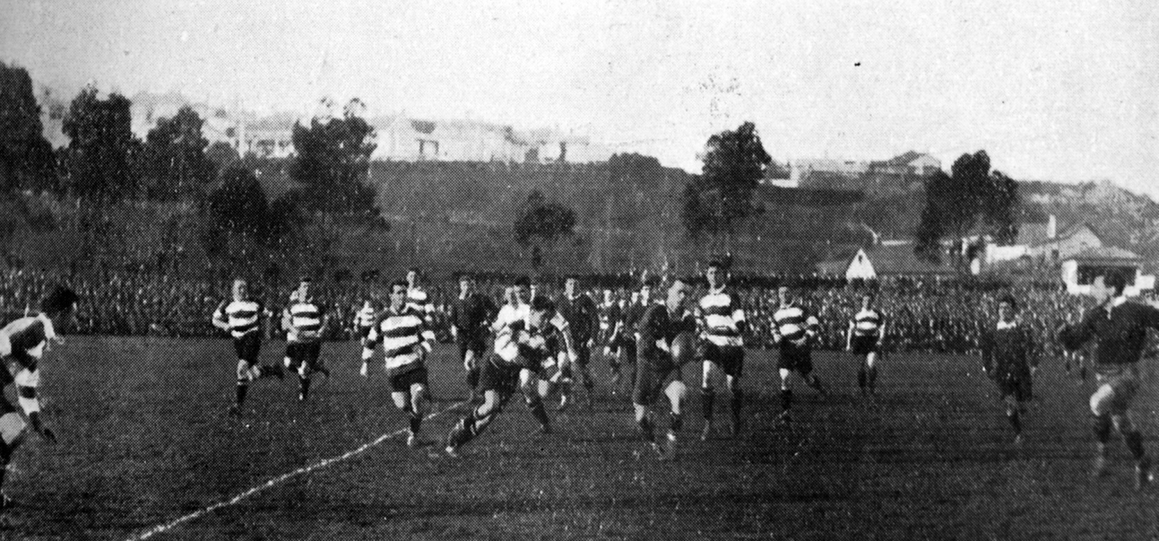 Fea (Otago) passes the ball to Perry in their interprovincial rugby match against Auckland at...