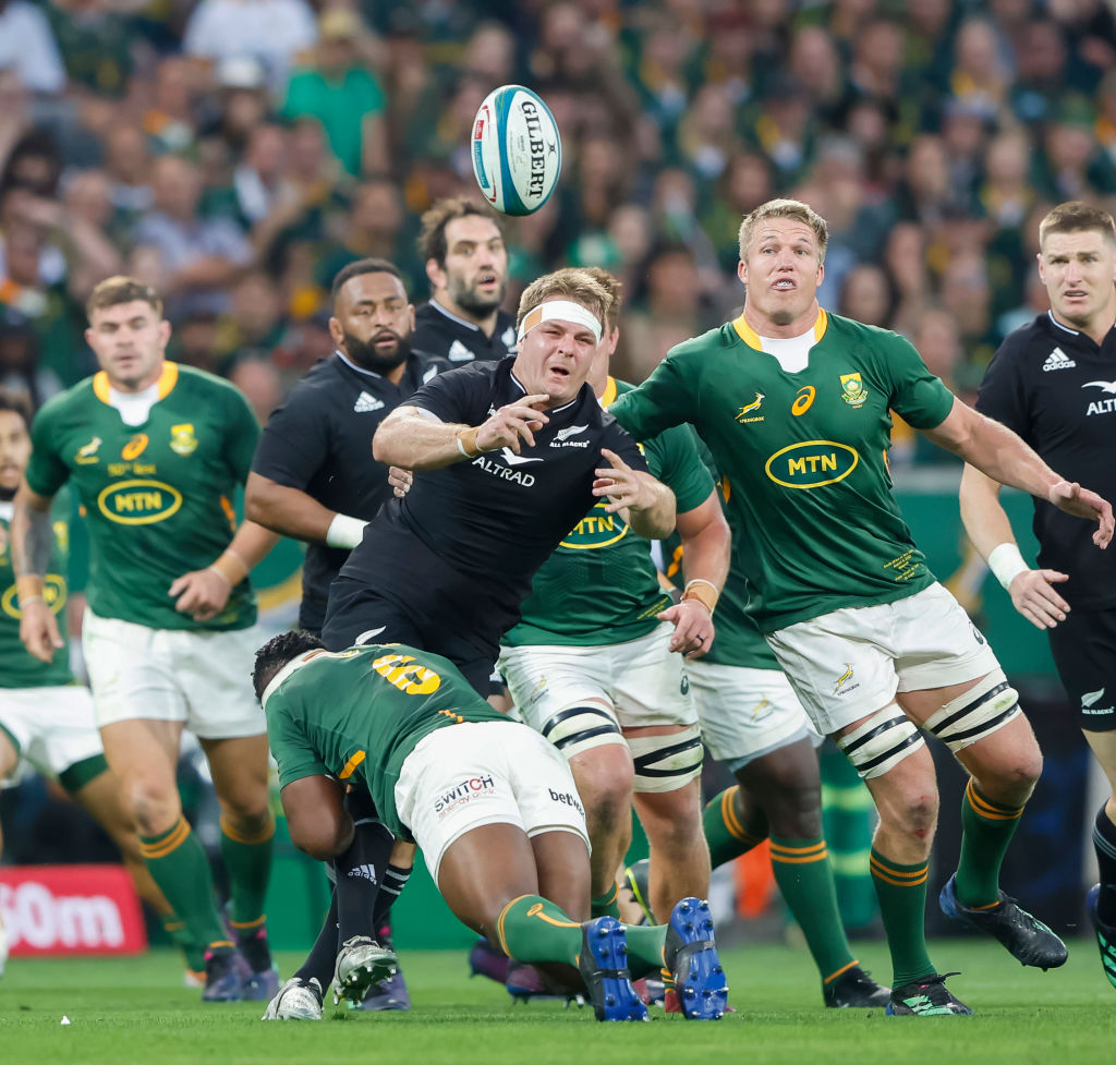 All Blacks captain Sam Cane is hit in a tackle during the match against South Africa. Photo:...