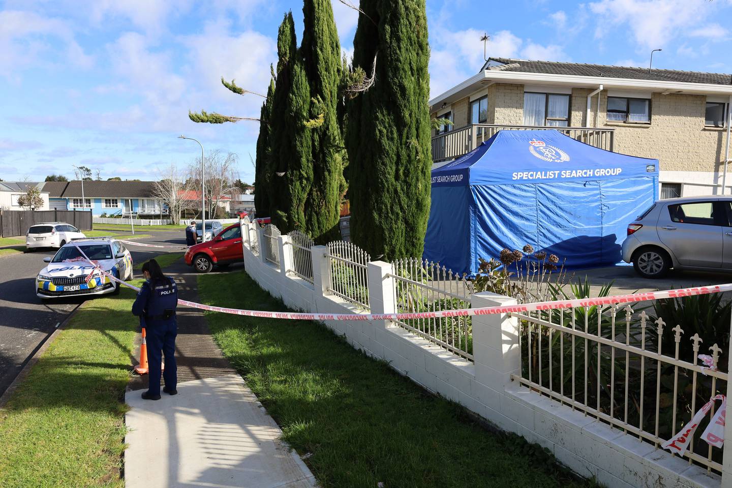 Police search a property in the suburb of Clendon Park. Photo: NZ Herald 