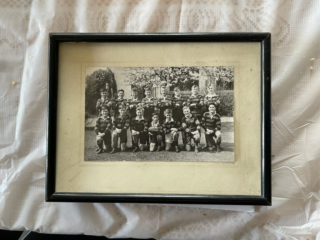 John Butcher was an avid rugby player at school. He is the player to the left of the ball in this...