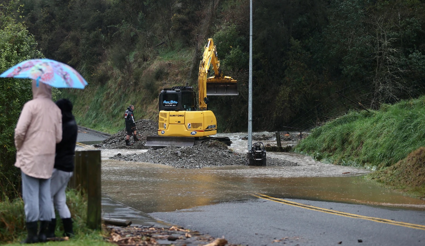 A digger works to clear a slip in Nelson. Photo: George Heard