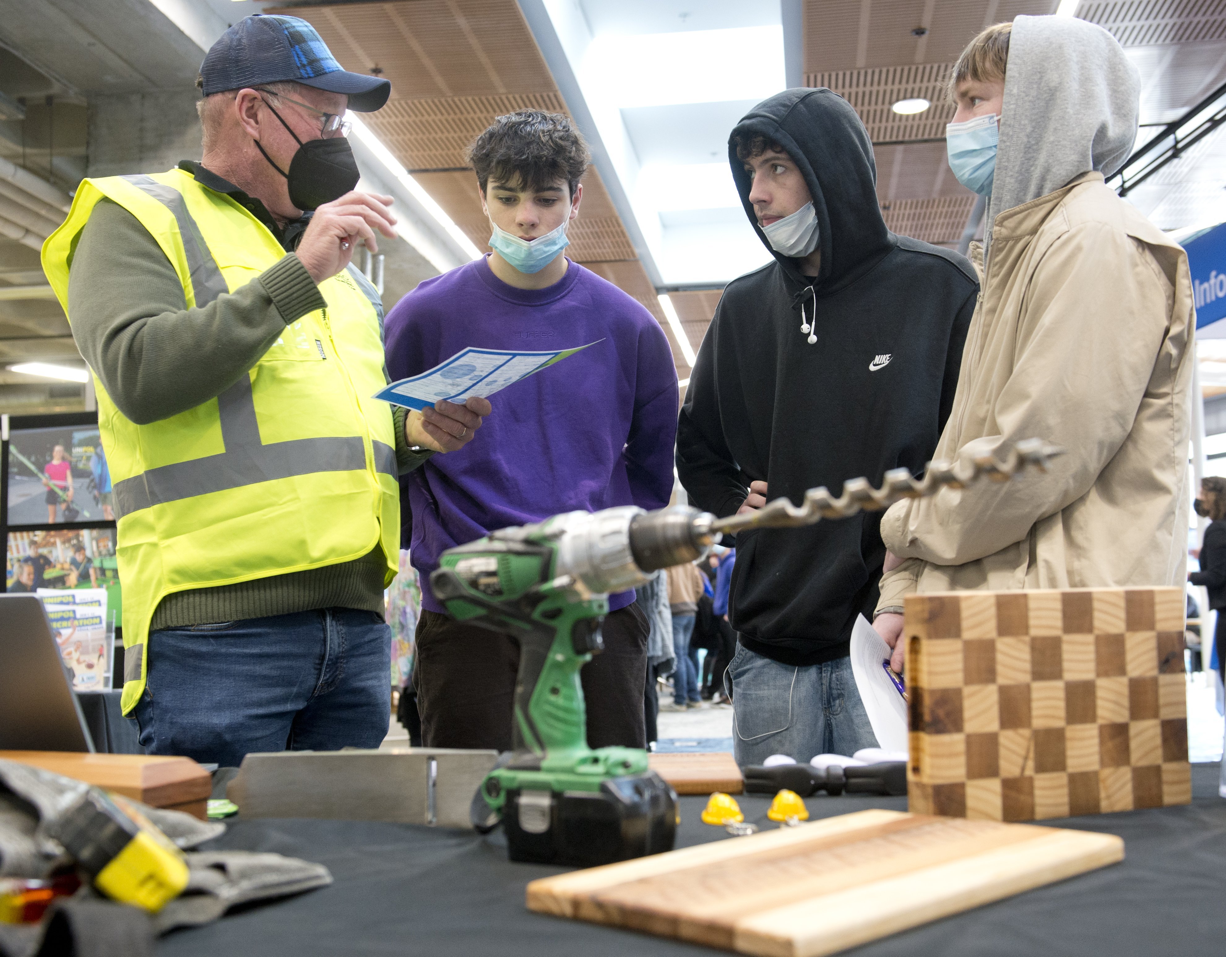 Otago Polytechnic carpentry lecturer Kevin Dunbar explains the course curriculum to Christchurch...