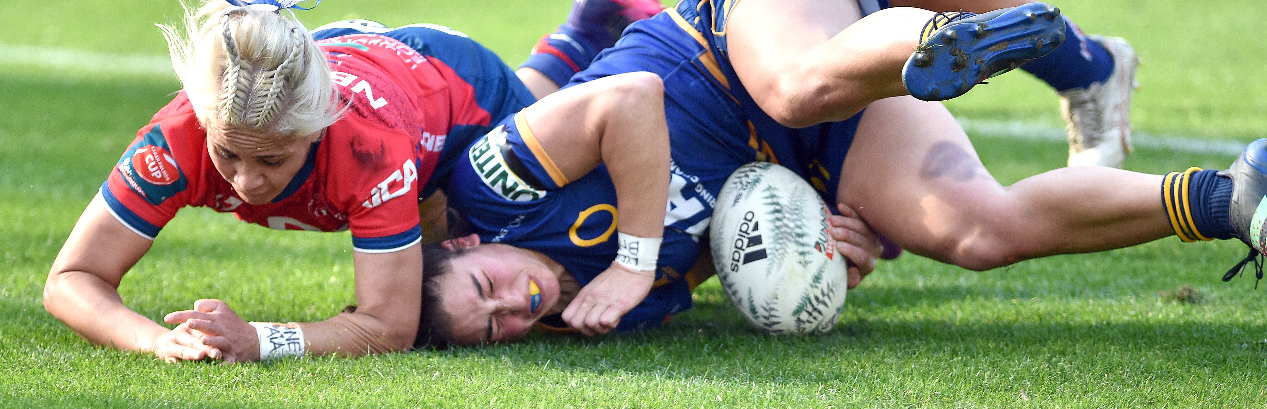 Otago Spirit fullback Sheree Hume scores a try in front of Tasman defender Sui Pauaraisa at...