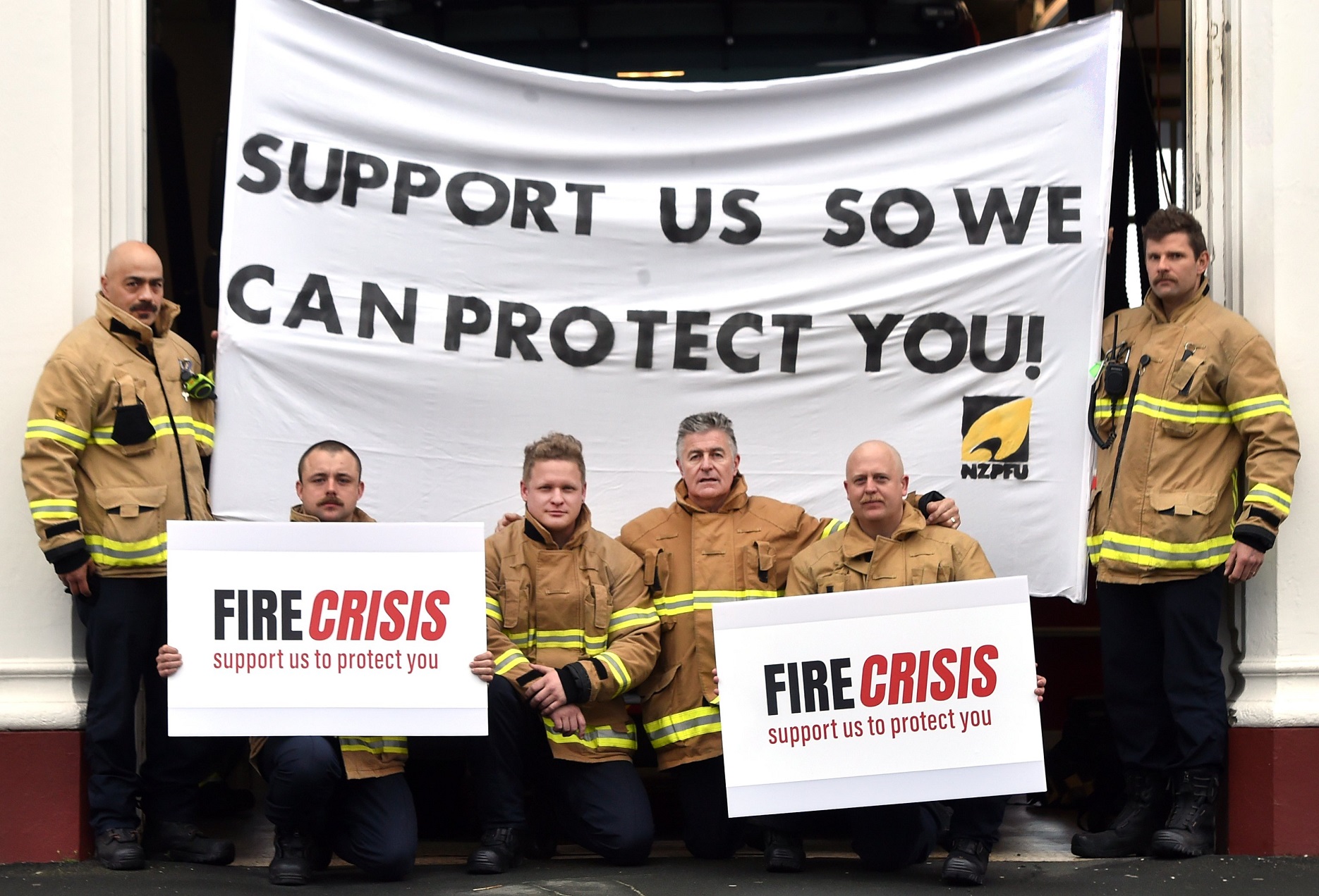 Dunedin firefighters getting ready to strike are (from left) Andre Robichaud, Liam McCall, Craig...