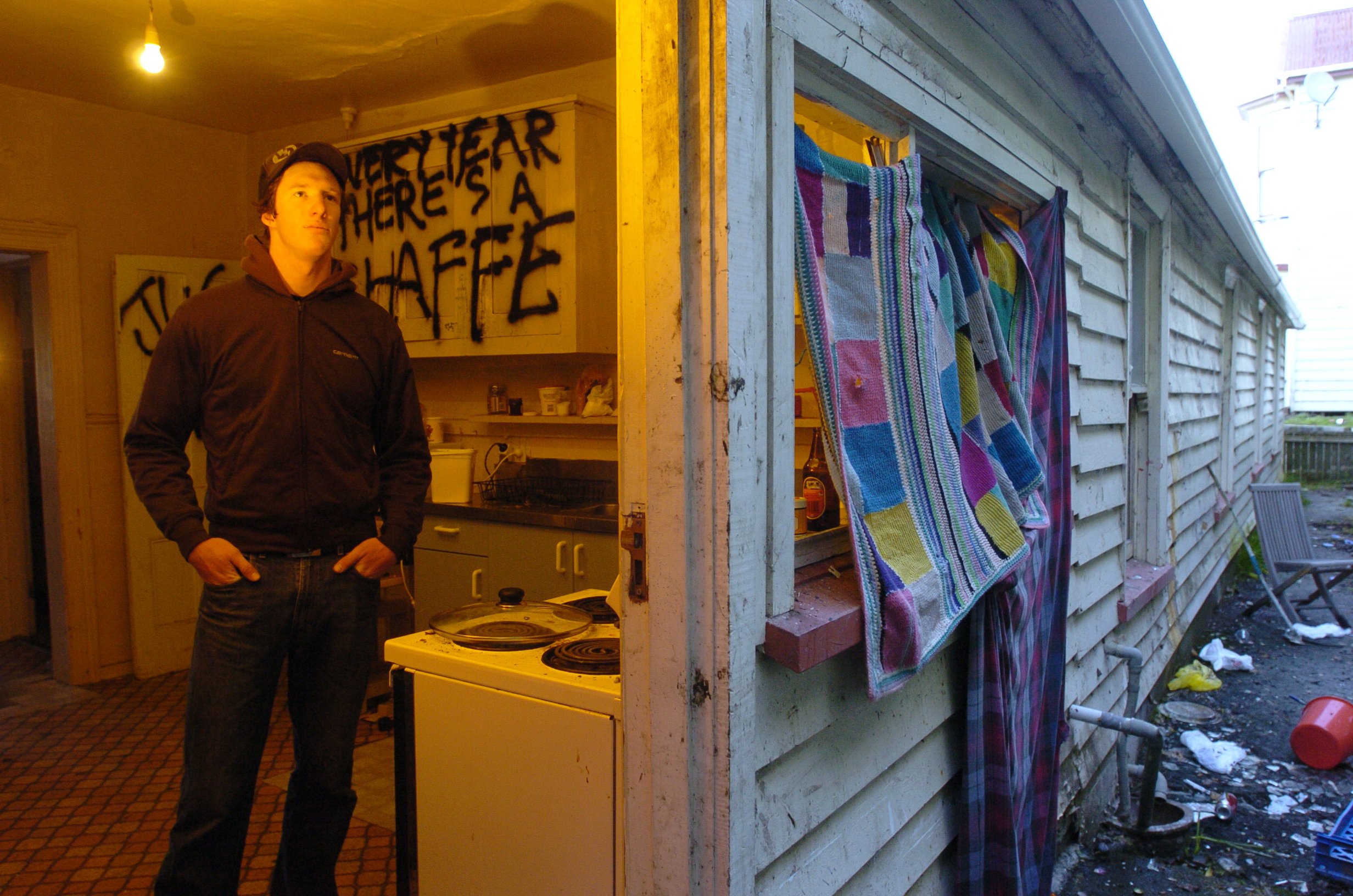 Third-year University of Otago student Sam Uffindell braves the kitchen of his environmentally...