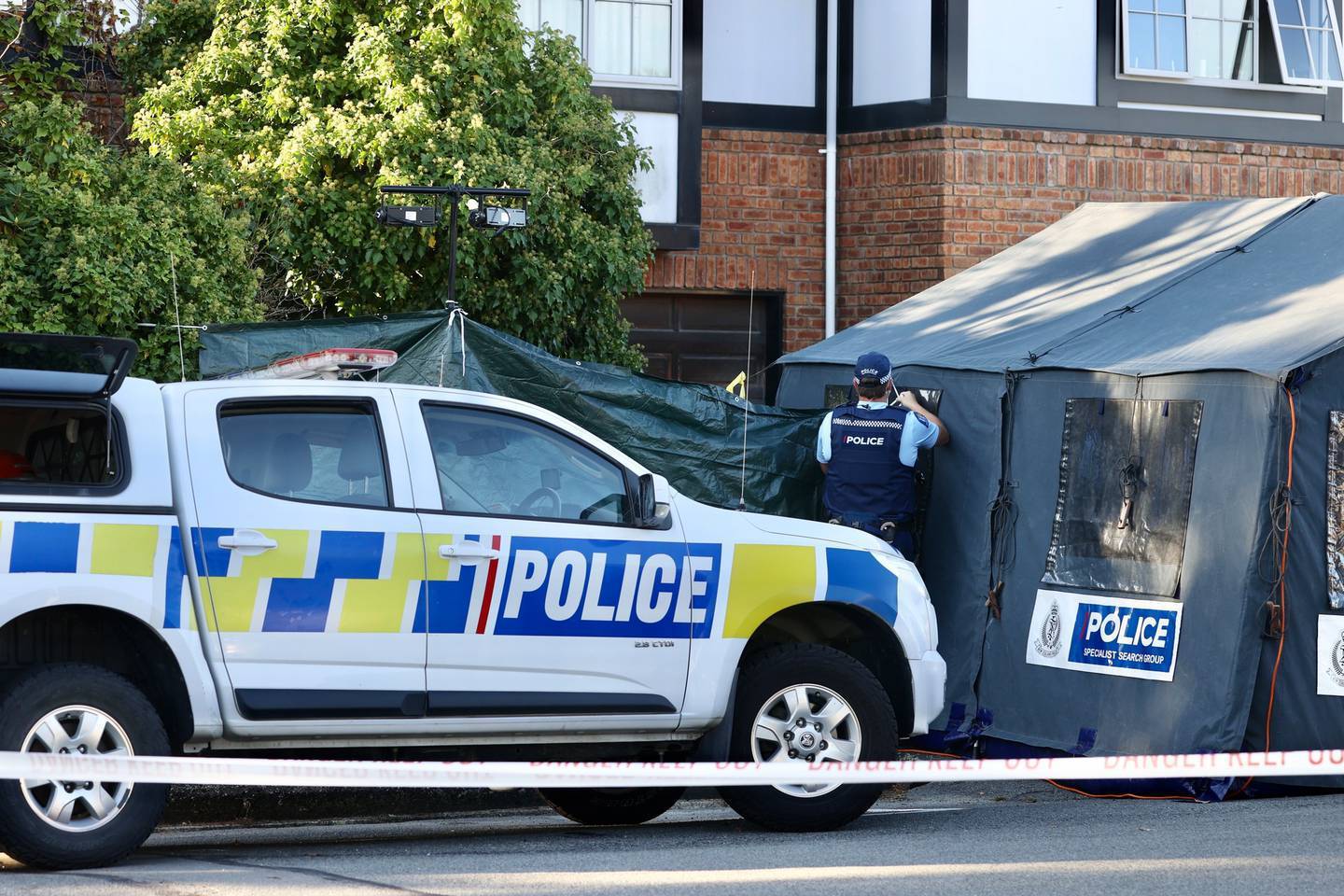 Police at the scene of the double death in Christchurch. Photo: George Heard