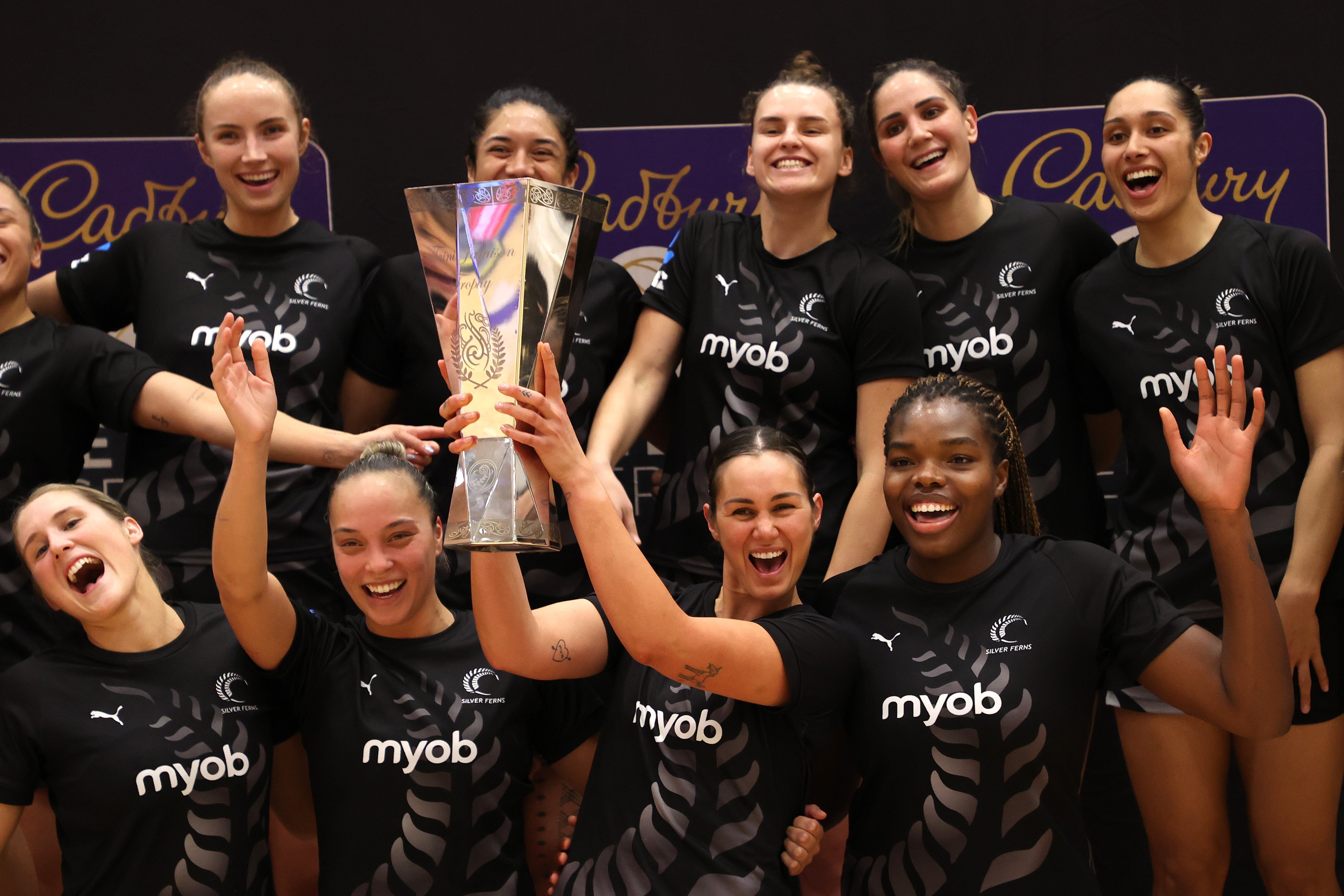 Silver Ferns skipper Ameliaranne Ekenasio holds the Taini Jamison Trophy in Auckland last night...